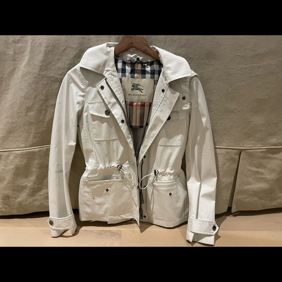 Burberry hooded raincoat, lined in Burberry signature checks.